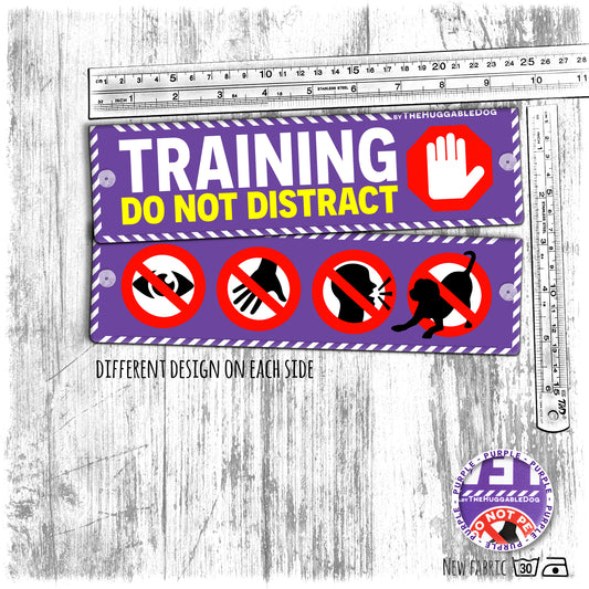 "Training, do not distract", plus signs on the other side. Dog training Leash sleeves.