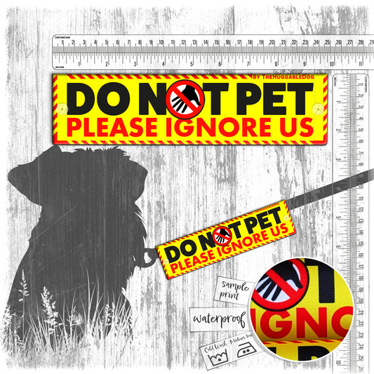 48. "DO NOT PET, please ignore us". Warning leash sleeves for dog training.