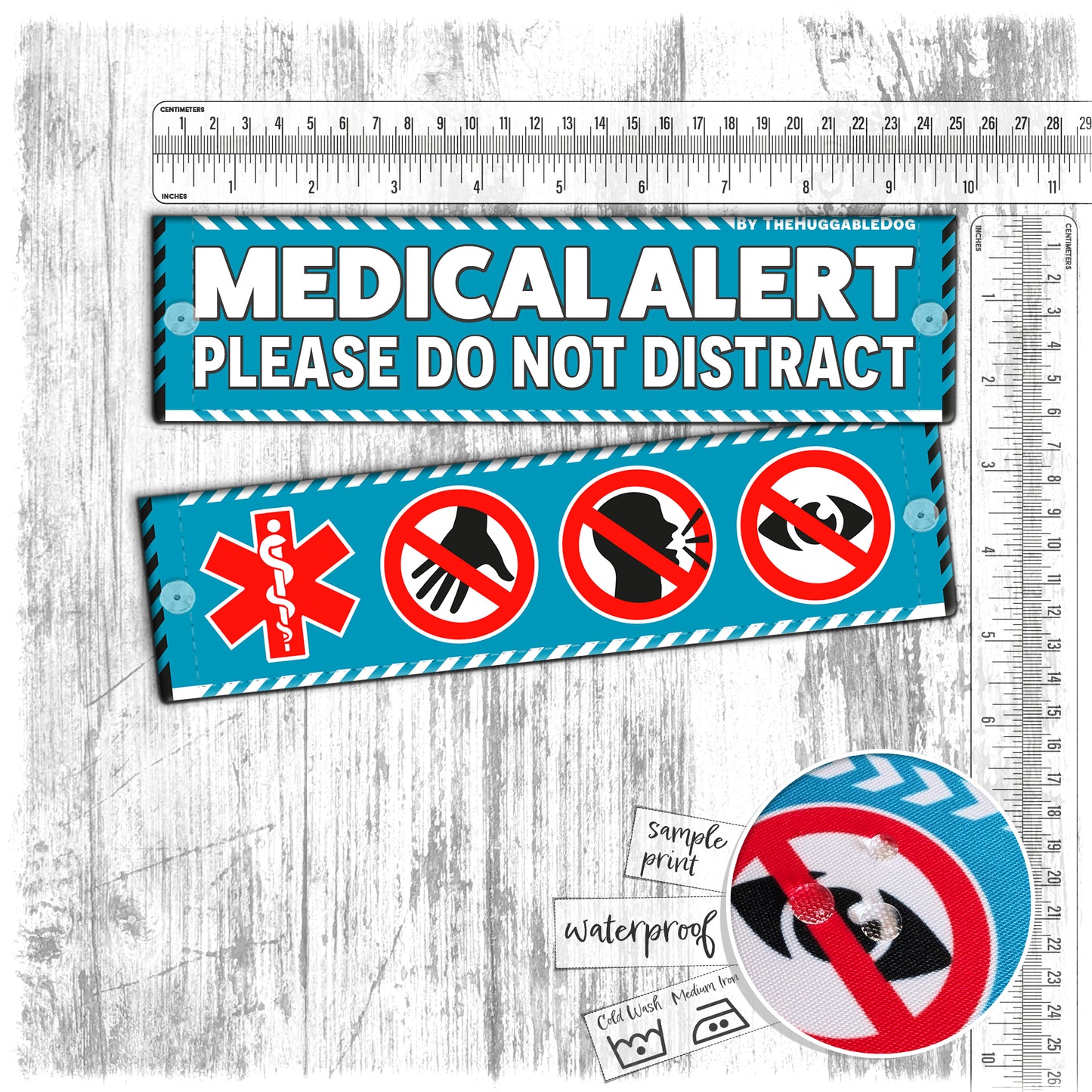 54. "MEDICAL ALERT, please do not distract". Plus signs on the other side. Leash sleeves.
