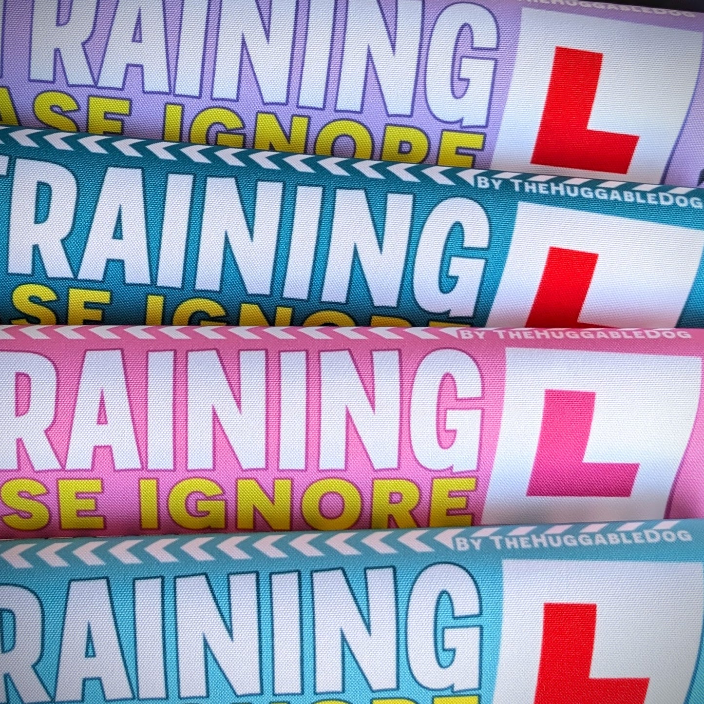 77. "In Training, please ignore". Leash sleeves.