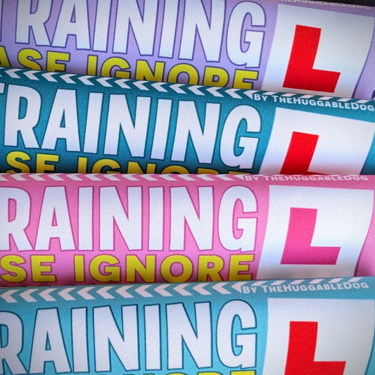 77. "In Training, please ignore". Leash sleeves.