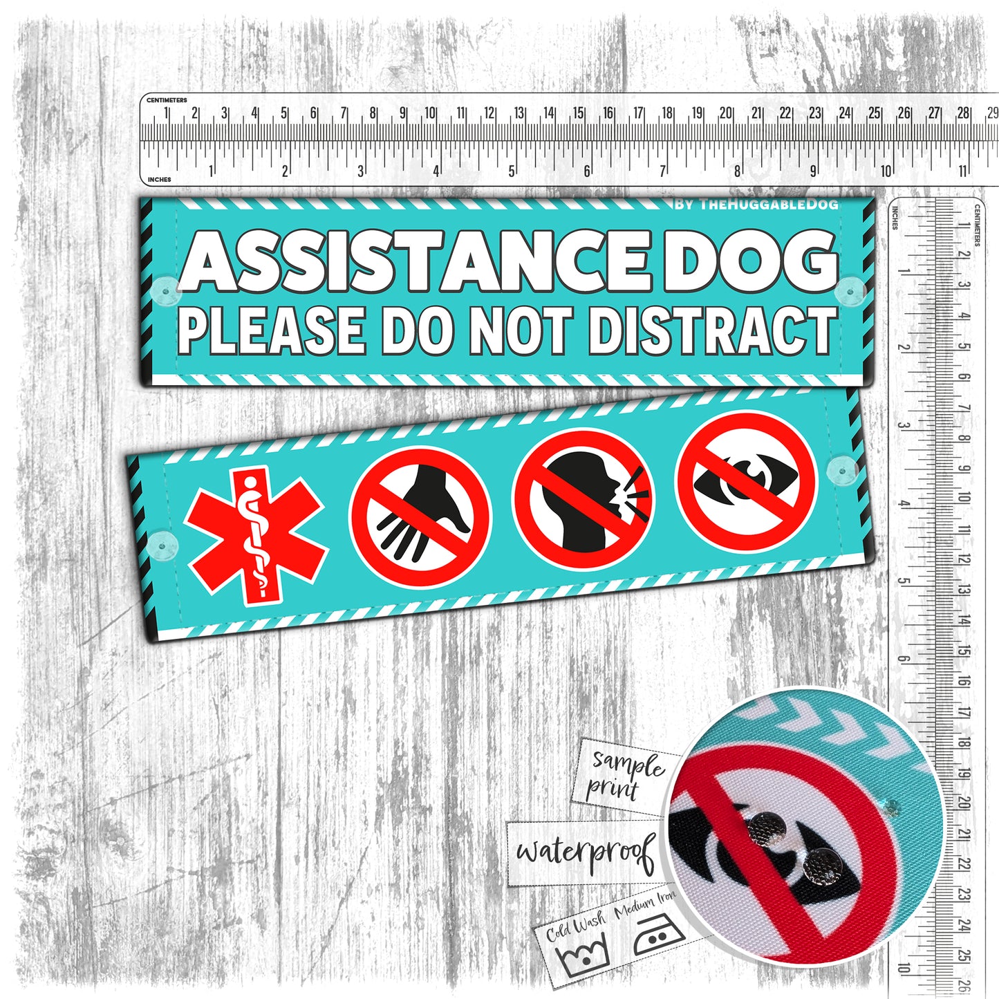 "ASSISTANCE DOG, please do not distract". Plus signs on the other side. Leash sleeves.