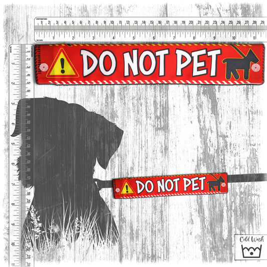 "Do not pet". Leash sleeve for dogs.