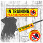 "IN TRAINING, please ignore". Do not pet. Warning leash sleeves for dog training.