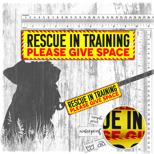 "RESCUE in TRAINING, please give space". Warning leash sleeves for dog training.